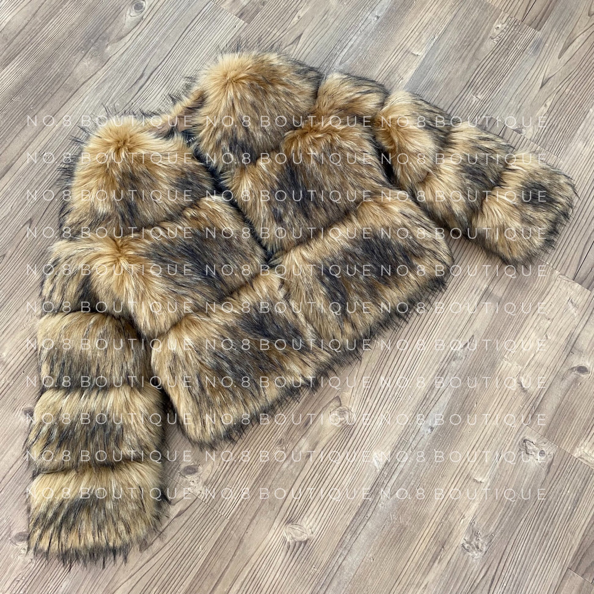 Designer raccoon faux fur jacket for a bold look