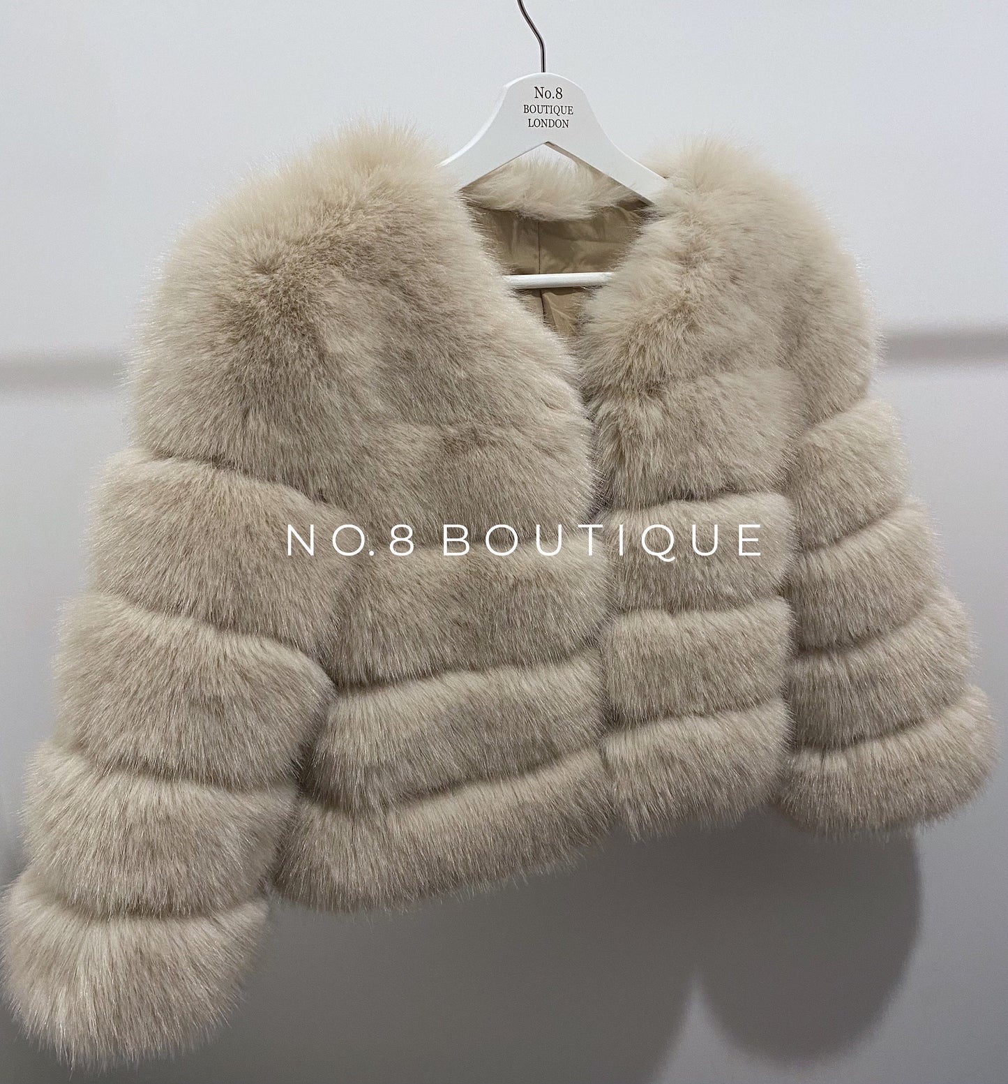 Elegant beige 5 row faux fur jacket