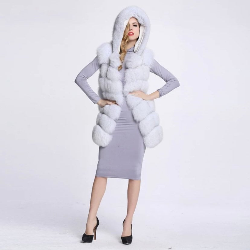 Luxurious hooded faux fur gilet with seven panel design