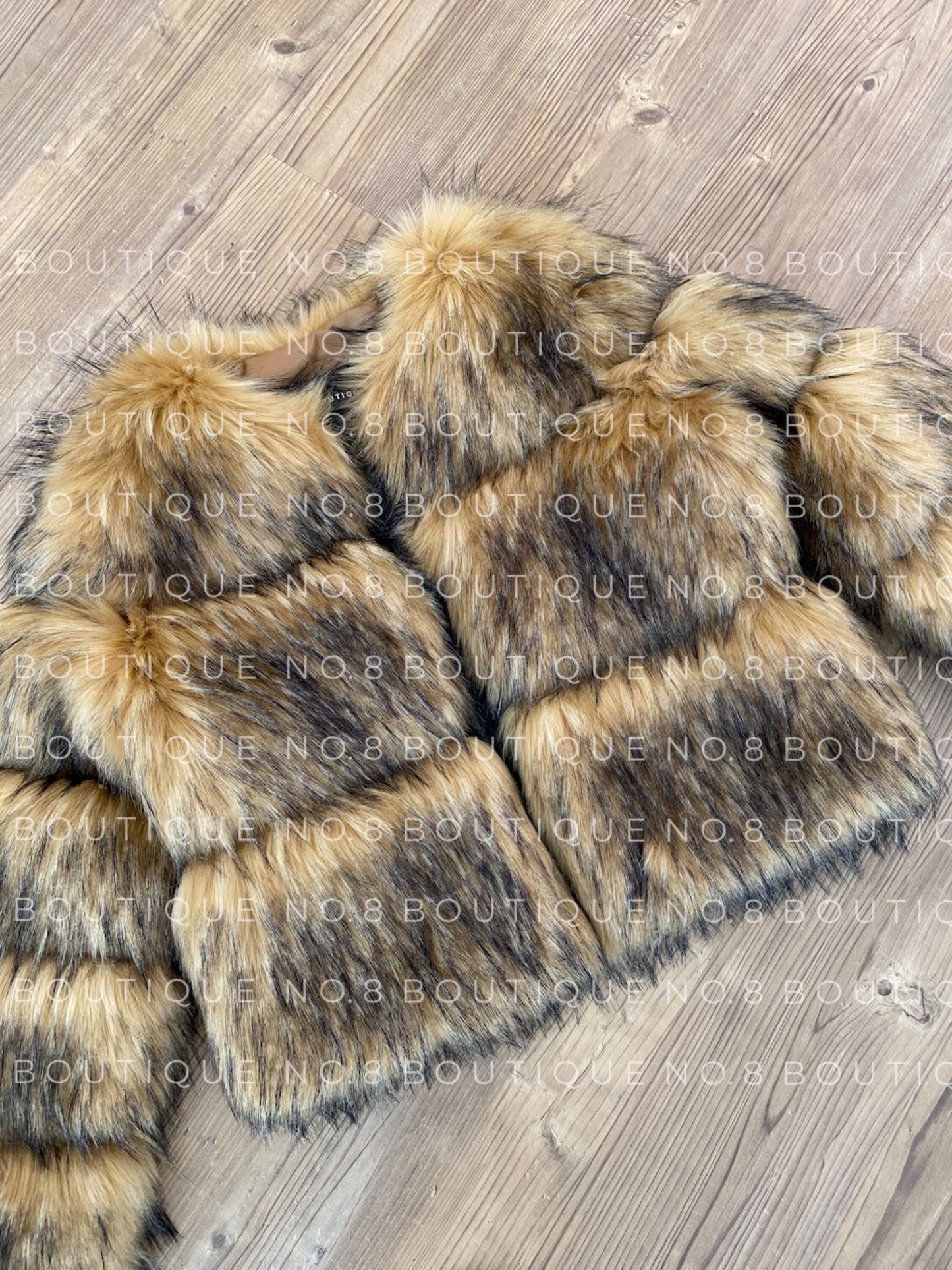 Runway-ready raccoon faux fur jacket