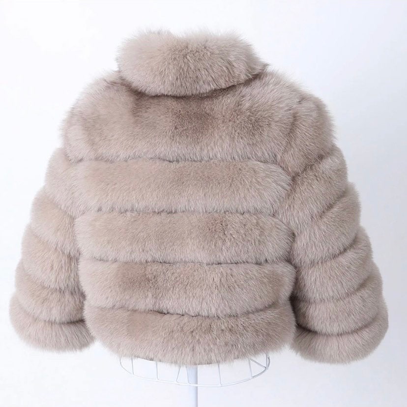 Sophisticated womens faux fur jacket with a premium collar